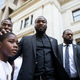 Rapper Meek Mill departs with his son Rihmeek “Papi” Williams after a hearing at a Pennsylvania appeals court in Philadelphia, Tuesday, July 16, 2019.